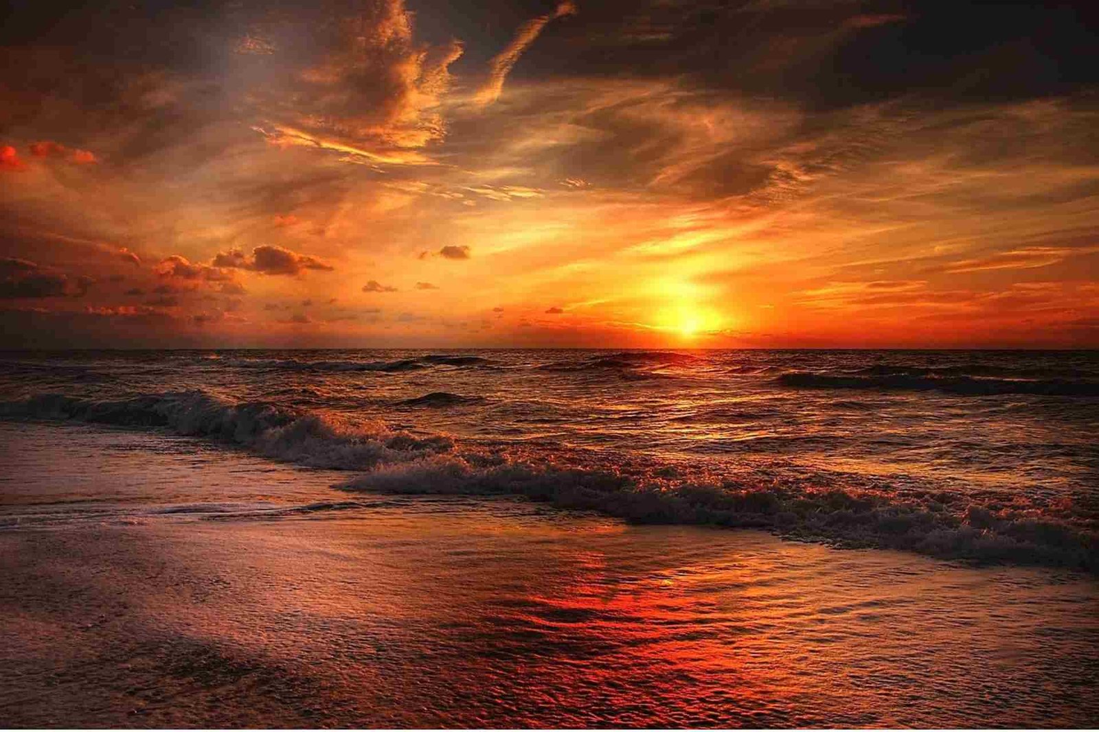 Bakkhali Sea Beach sunset with red sky and sunshade view