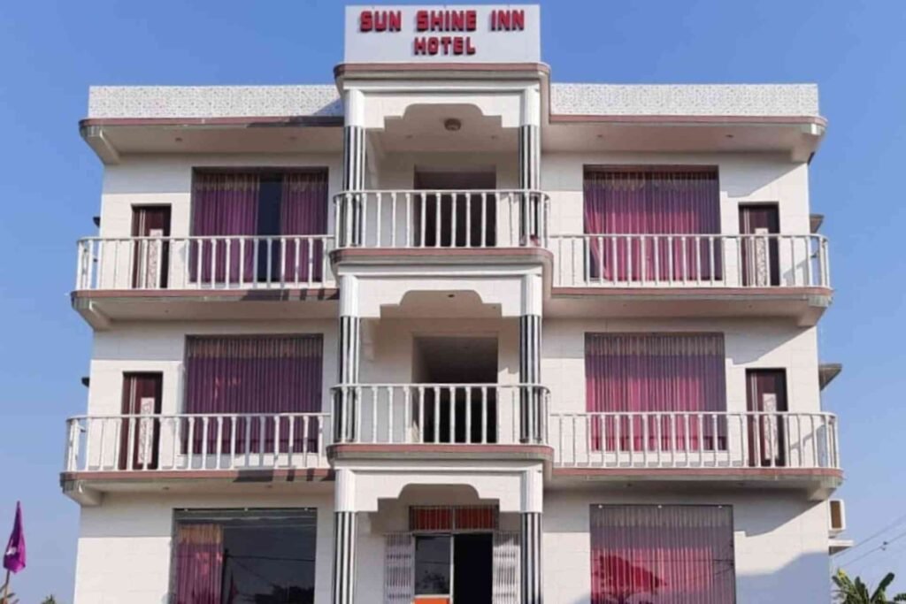 Hotel Sunshine Inn Bakkhali white building with balconies and modern exterior in daylight